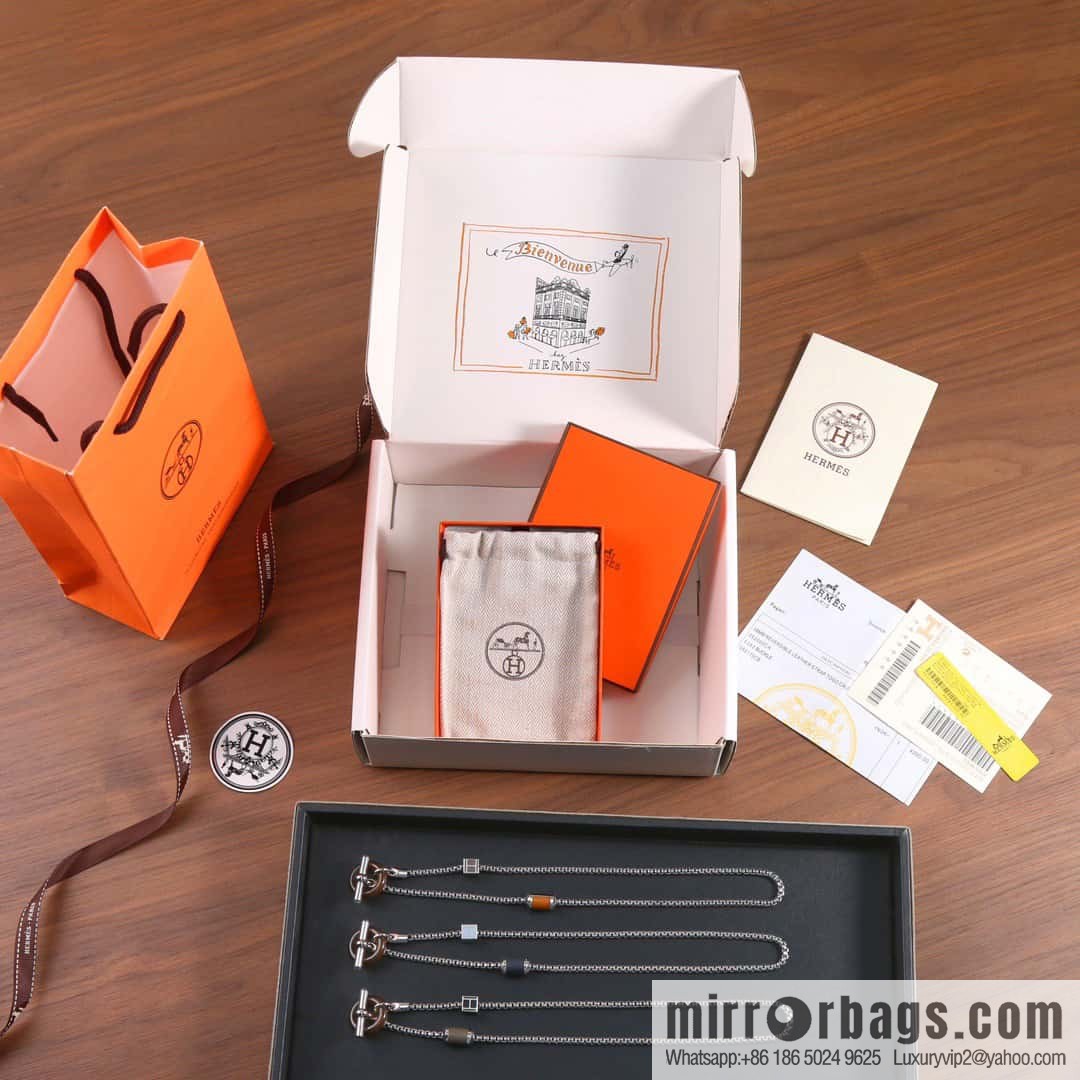 Hermès necklace, bracelet HERMES meli-melo horn ring necklace