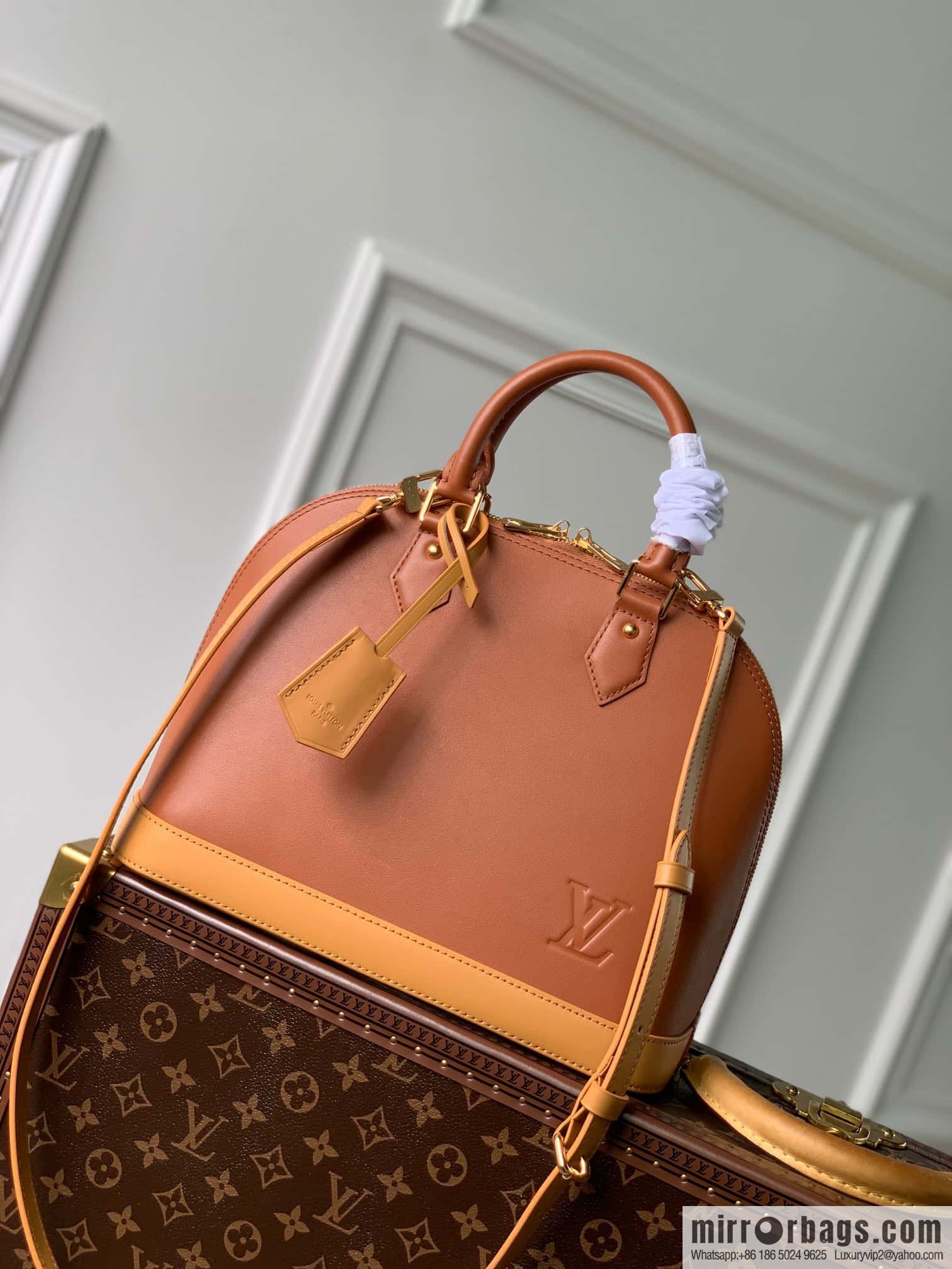 LV shell bag Alma small handbag M91611