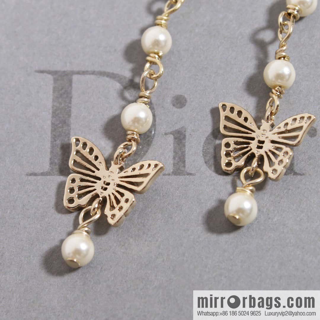 New ☑️ Dior tassel gold butterfly pearl CD stud earrings