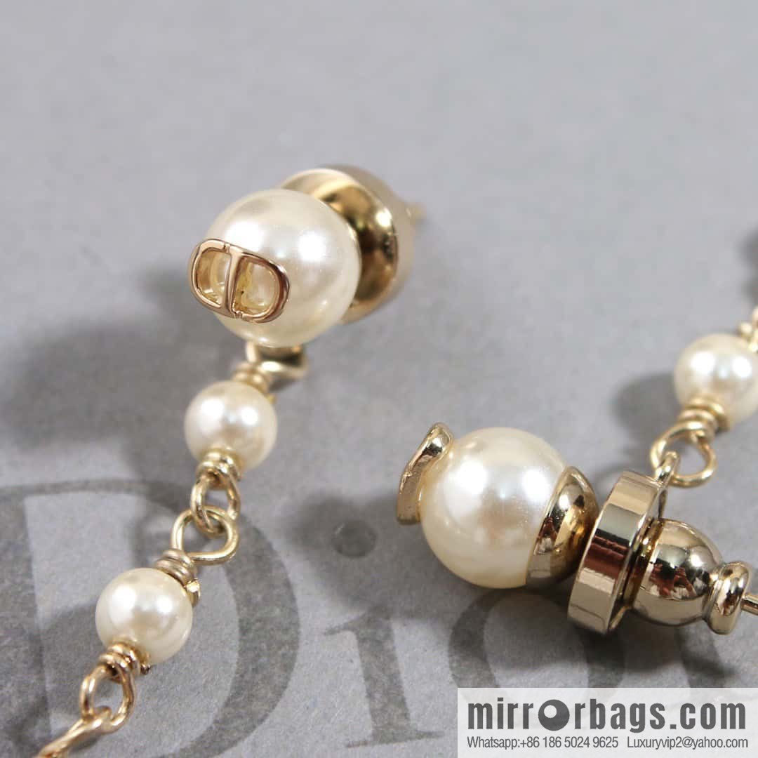 New ☑️ Dior tassel gold butterfly pearl CD stud earrings