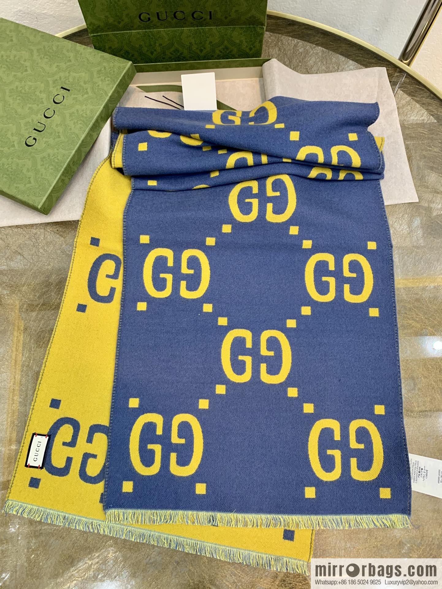 GUCCI Gucci GG pattern wool scarf 495592