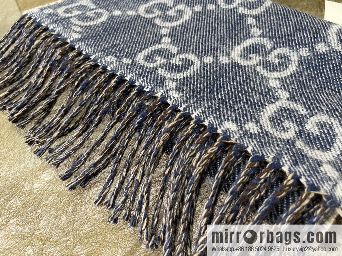 GUCCI Gucci GG pattern double-sided wool scarf 676610
