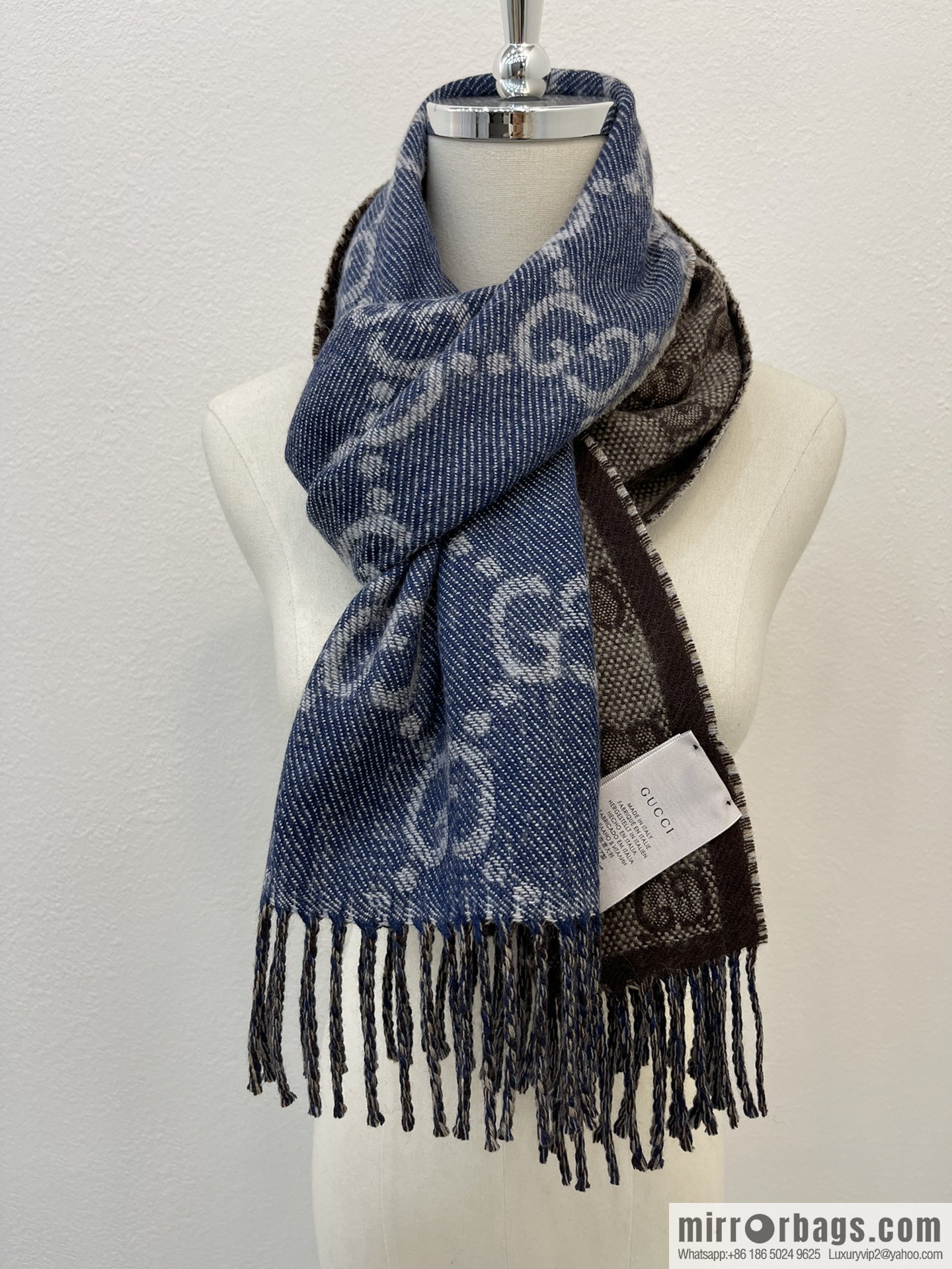 GUCCI Gucci GG pattern double-sided wool scarf 676610