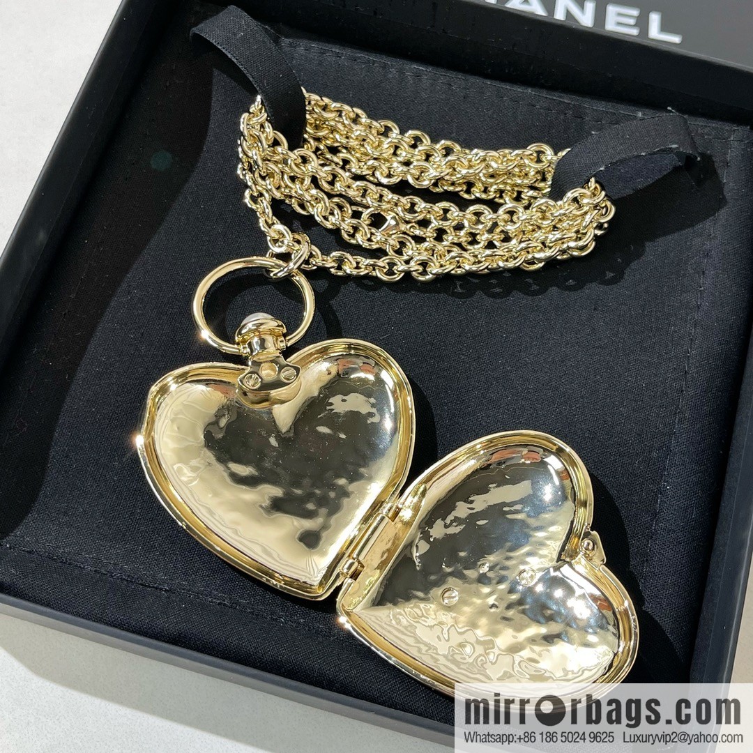 Chanel double c gold peach heart sweater chain necklace