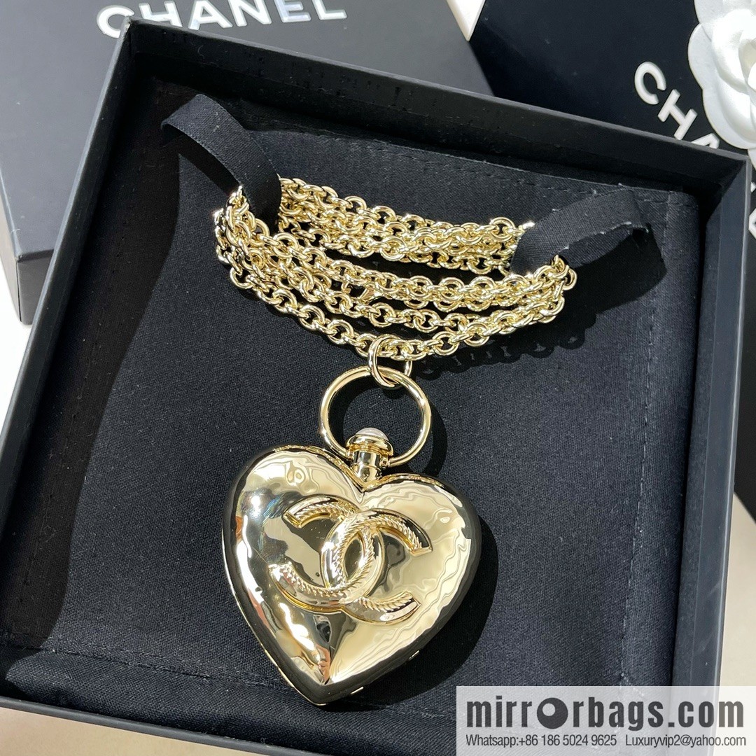 Chanel double c gold peach heart sweater chain necklace