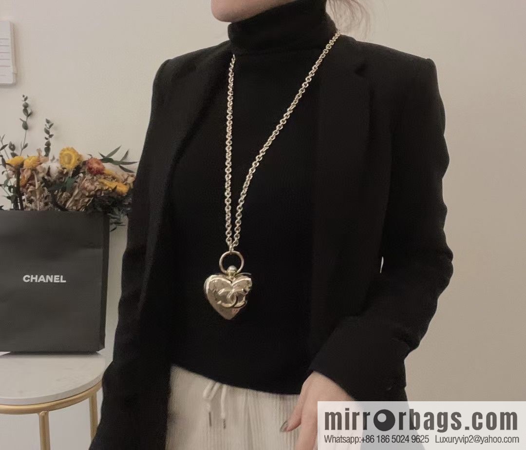 Chanel double c gold peach heart sweater chain necklace