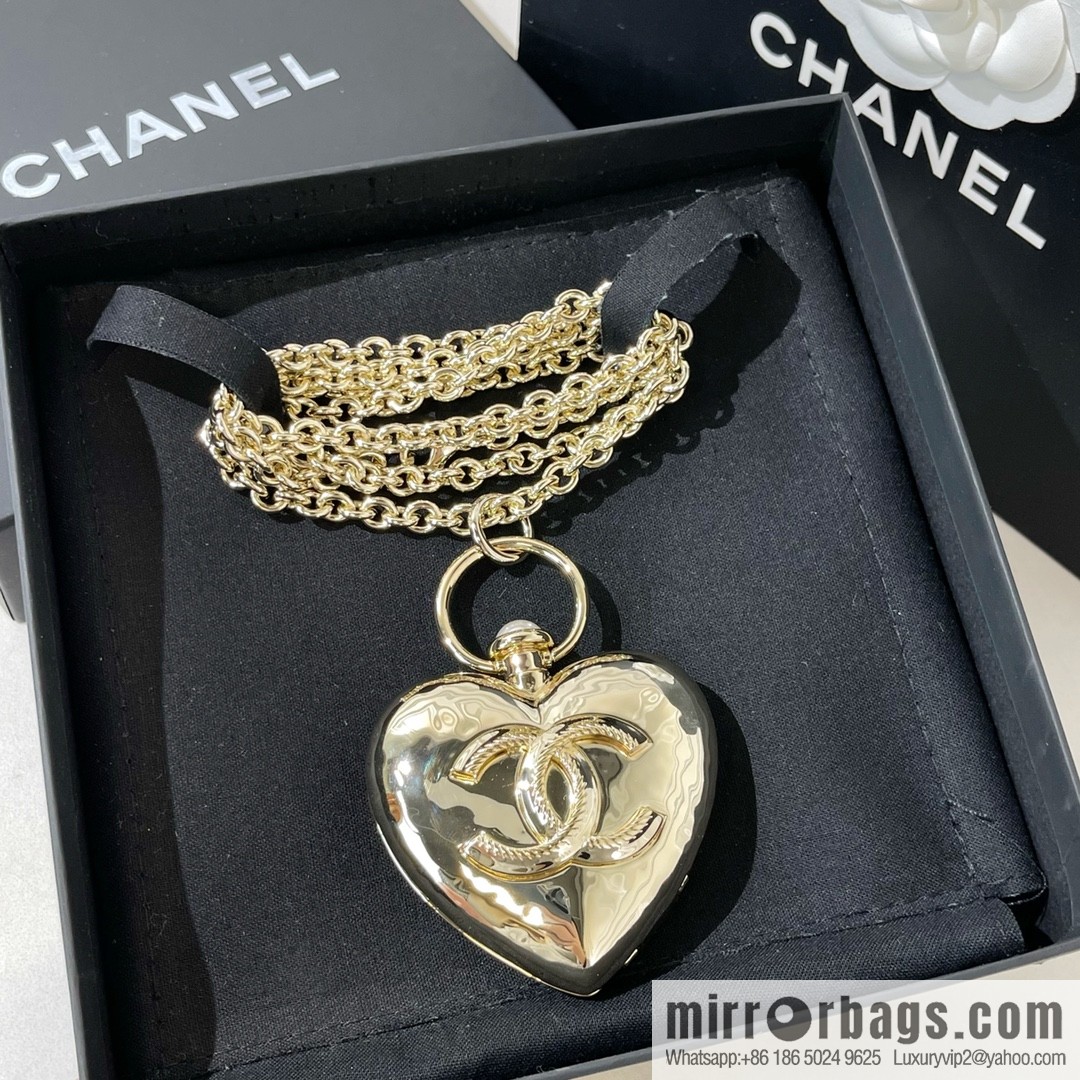 Chanel double c gold peach heart sweater chain necklace