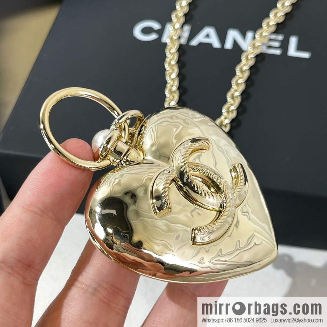 Chanel double c gold peach heart sweater chain necklace