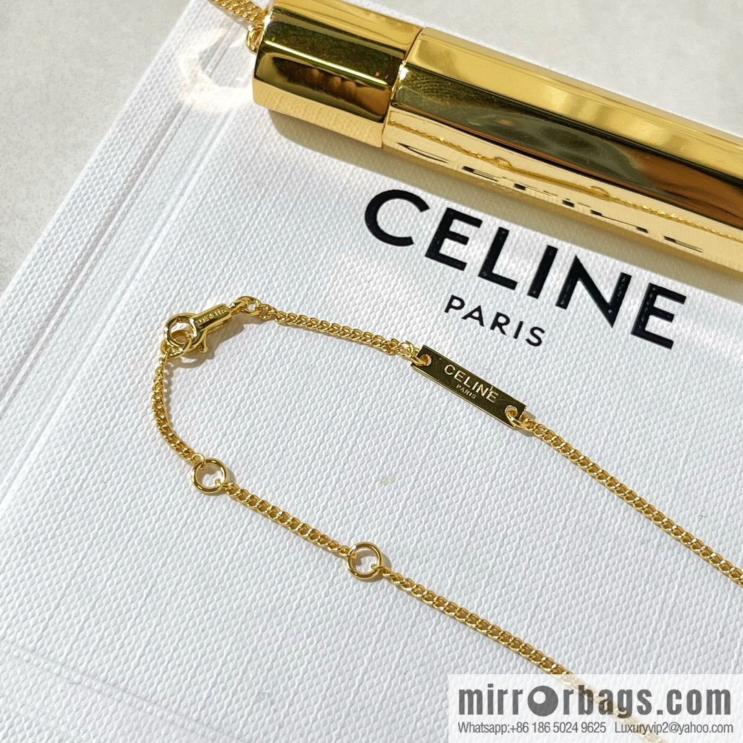 Celine gold bottle necklace