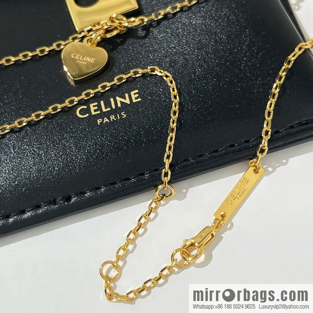 Celine cut-out peach heart necklace