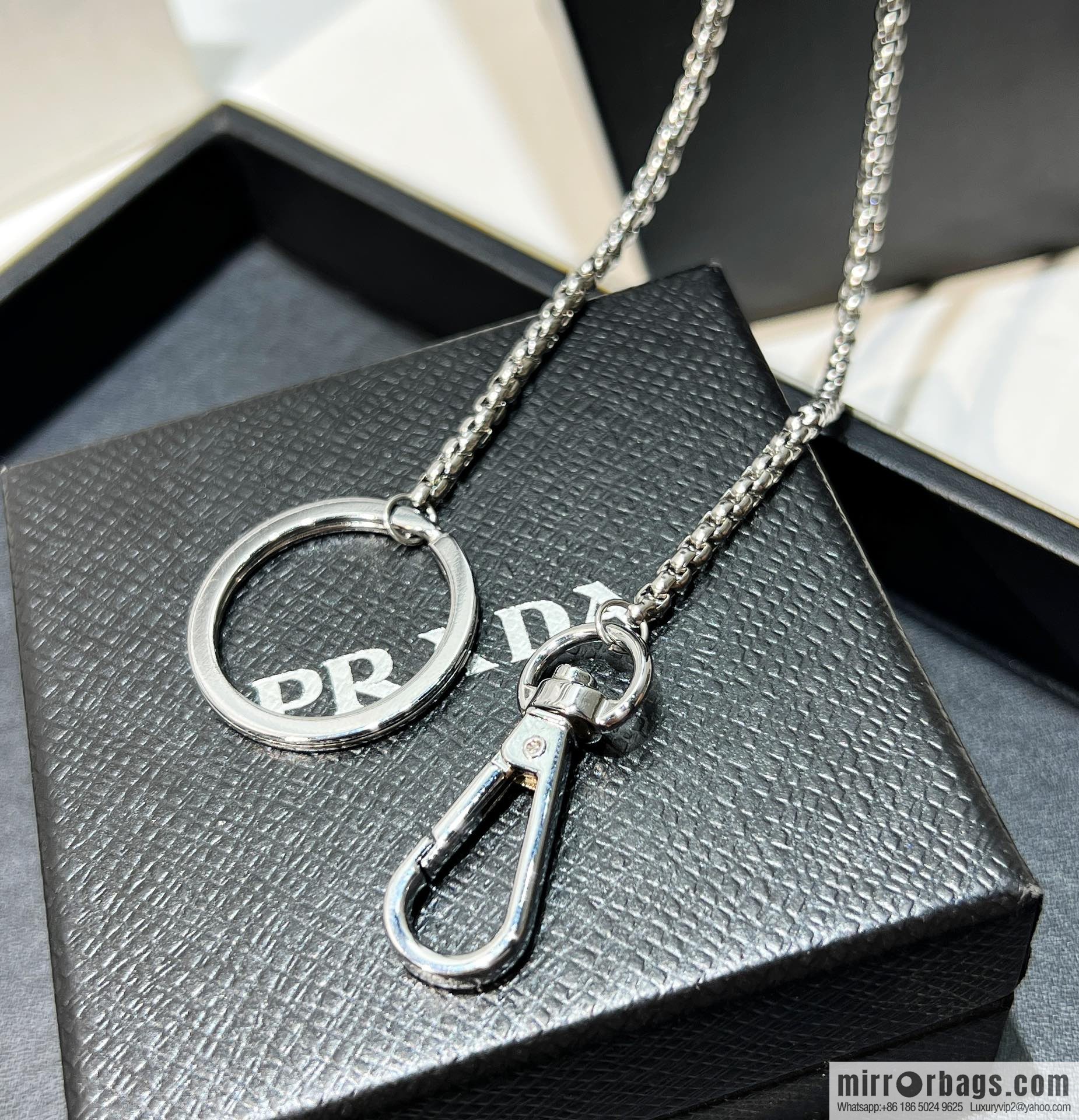 PRADA triangle, keychain necklace