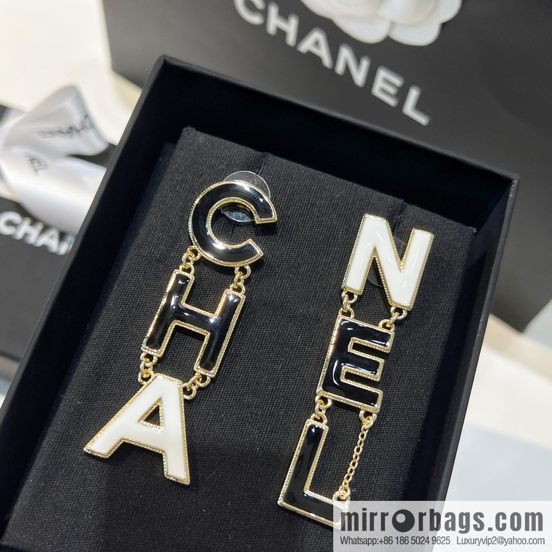 New ☑️ Chanel asymmetrical letter stud earrings