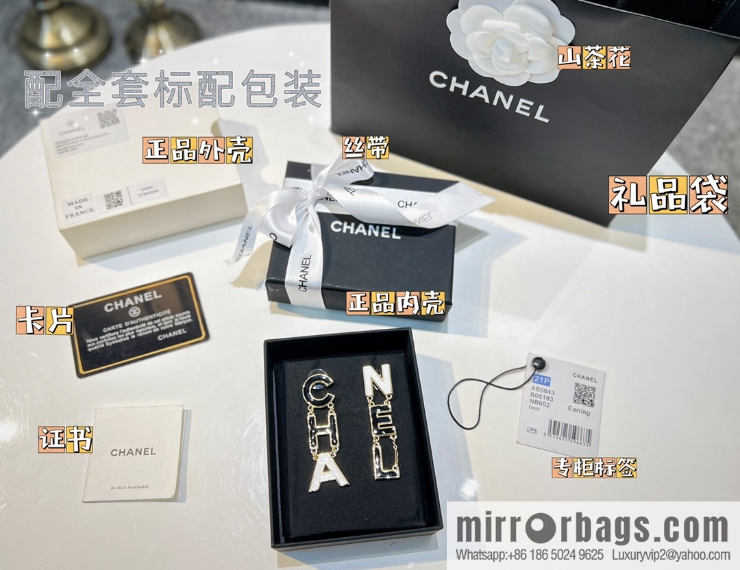 New ☑️ Chanel asymmetrical letter stud earrings