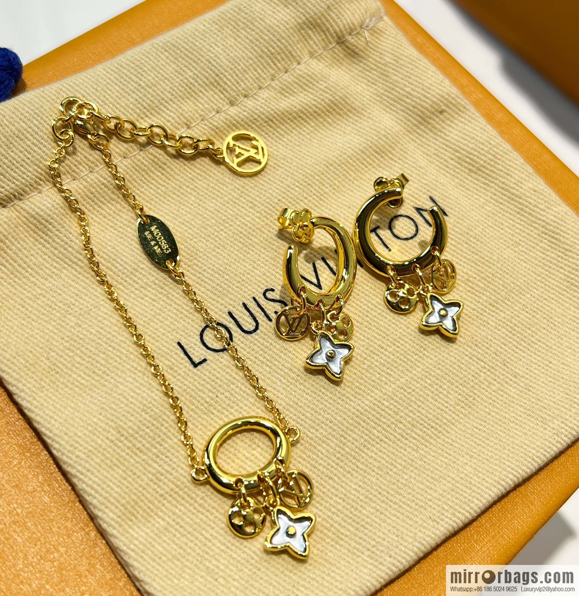 Louis Vuitton lv crystal monogram bracelet stud earrings