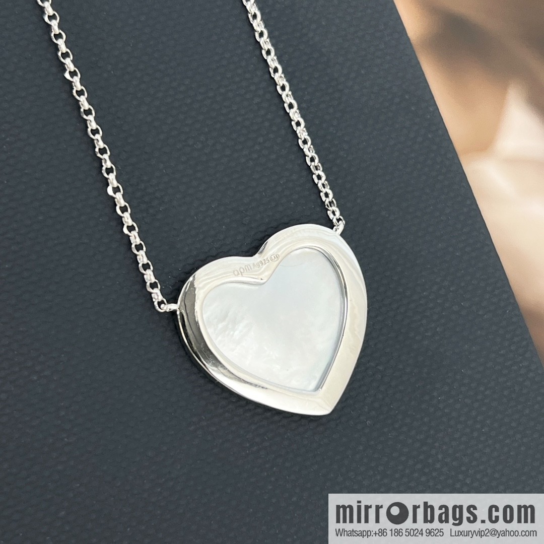 APM Monaco white mother shell love necklace adjustable