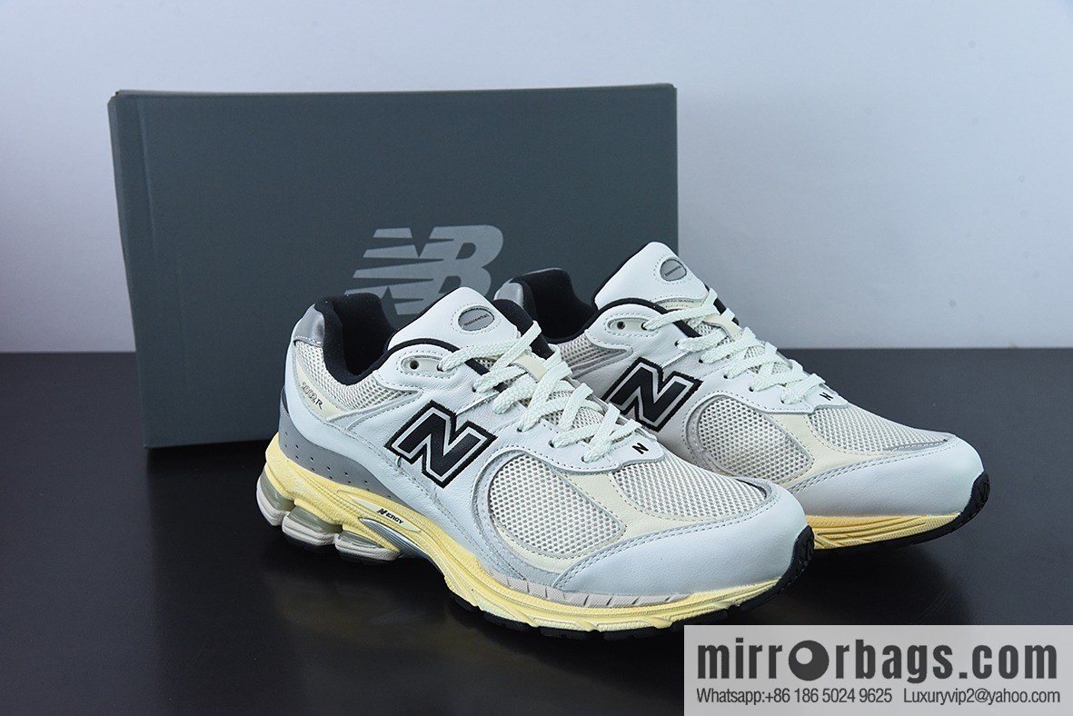 This is neverthat x New Balance ML2002RT joint Vintage casual running shoes