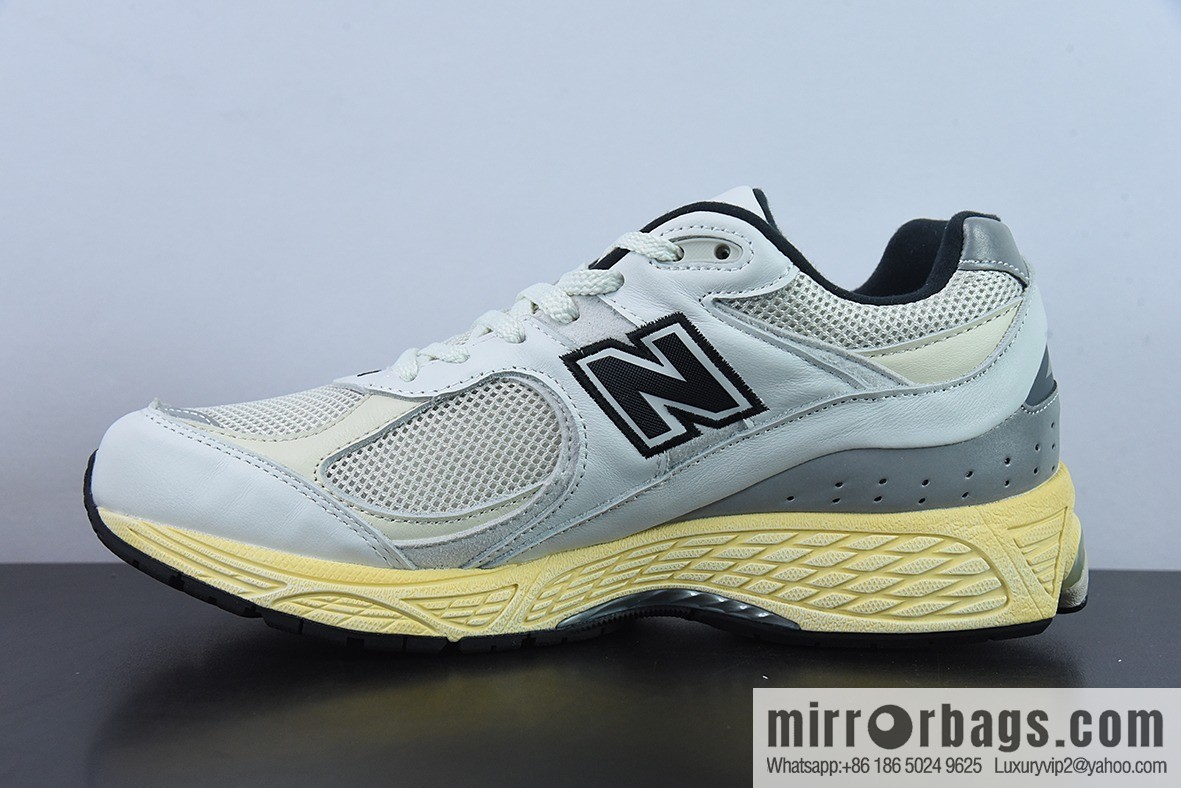This is neverthat x New Balance ML2002RT joint Vintage casual running shoes