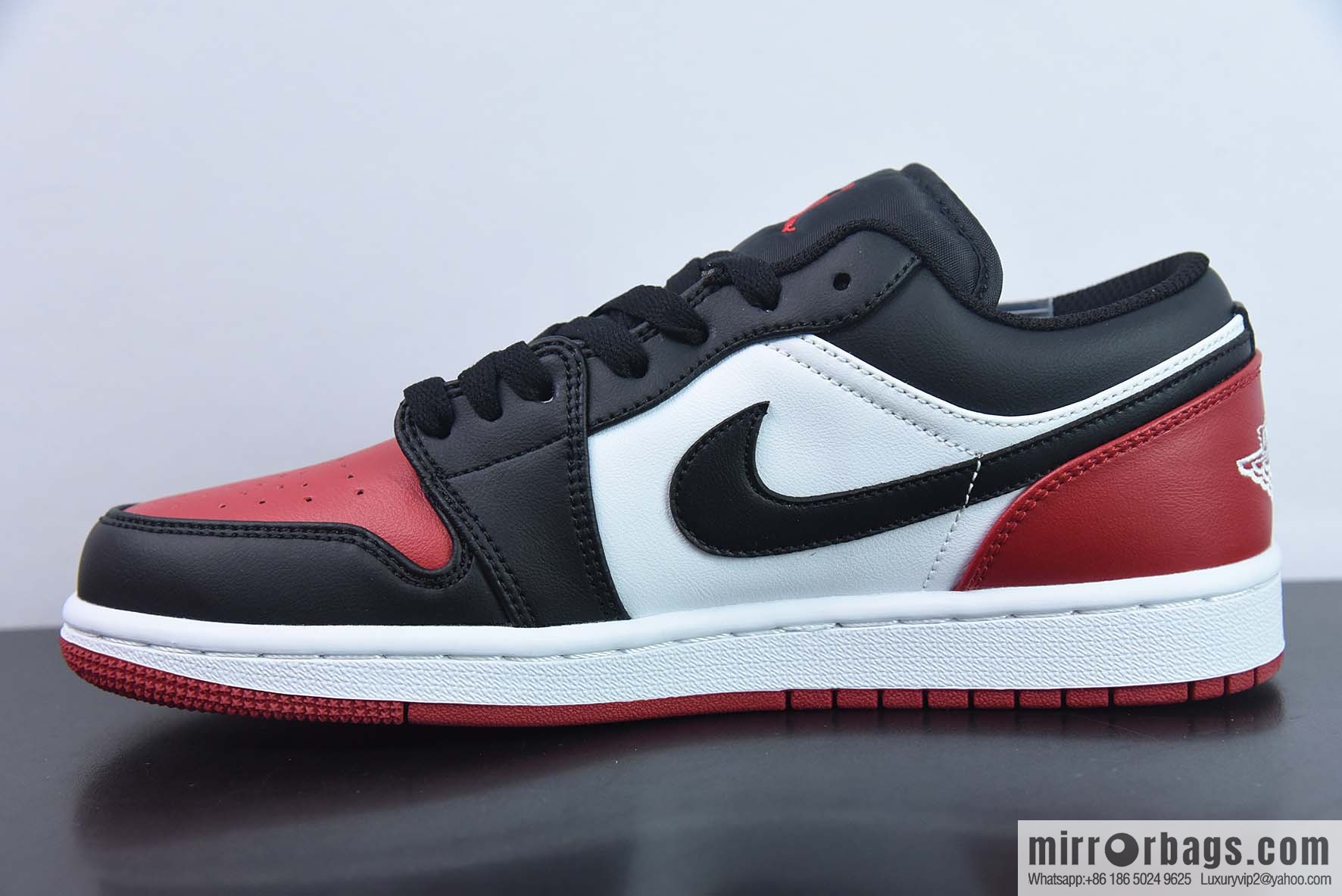 Air Jordan AJ1 Low Top, Black and Red Toes, Item Number: 553558-161
