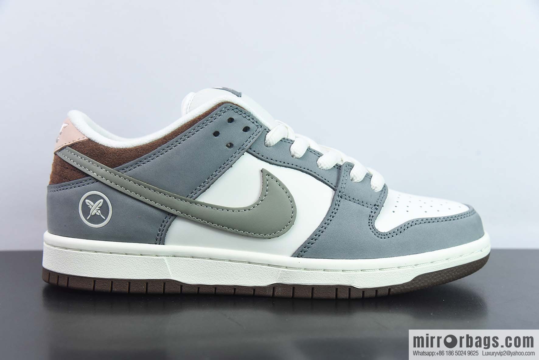 Nike Dunk Low ✖ Yuto Horigome Co-branded Gray and White Feather Low Top Sneakers Part Number: FQ1180 001