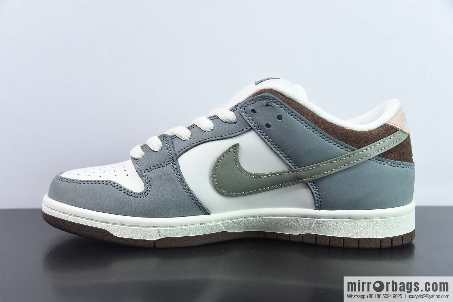 Nike Dunk Low ✖ Yuto Horigome Co-branded Gray and White Feather Low Top Sneakers Part Number: FQ1180 001