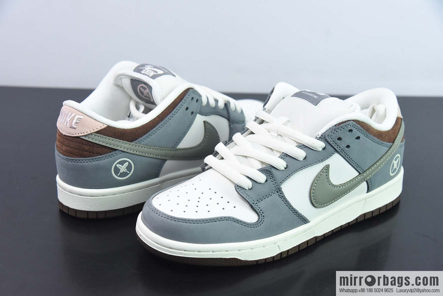 Nike Dunk Low ✖ Yuto Horigome Co-branded Gray and White Feather Low Top Sneakers Part Number: FQ1180 001