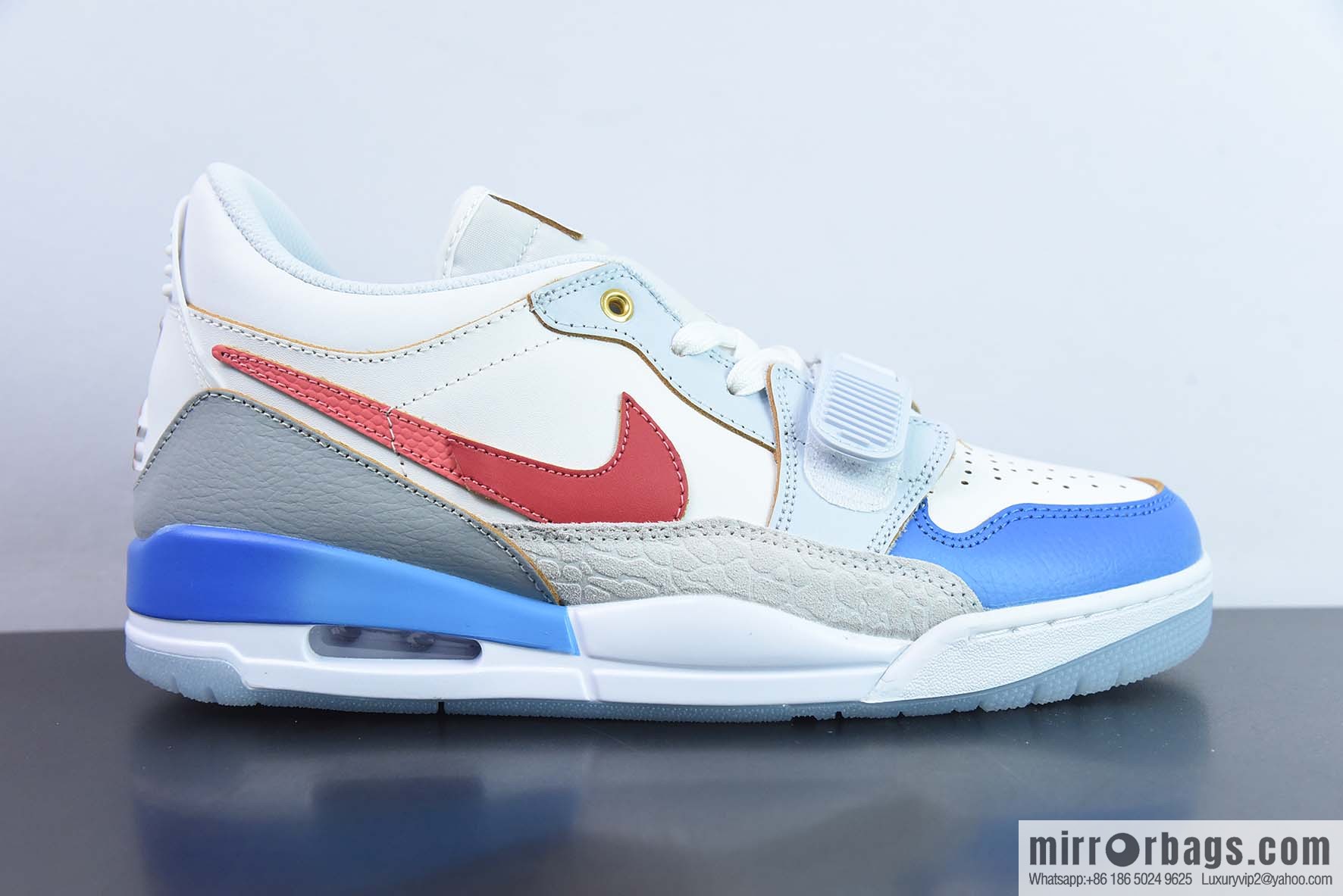 NK Air Jordan Legacy 312 Low Jordan's strongest three-in-one mixed version AJ312 white, blue and red, item number: FN8902-161