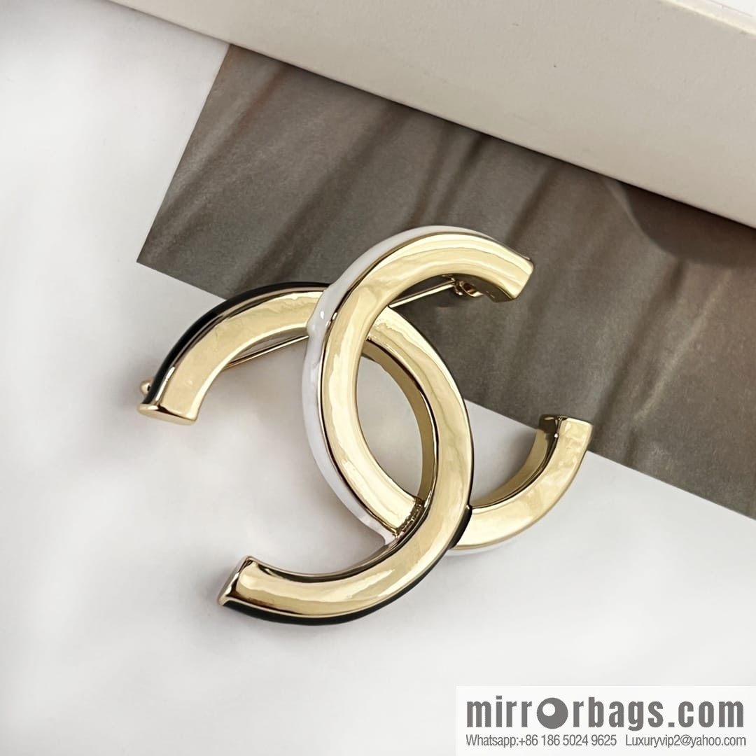 New ☑️ Chanel double c black and white smooth brooch