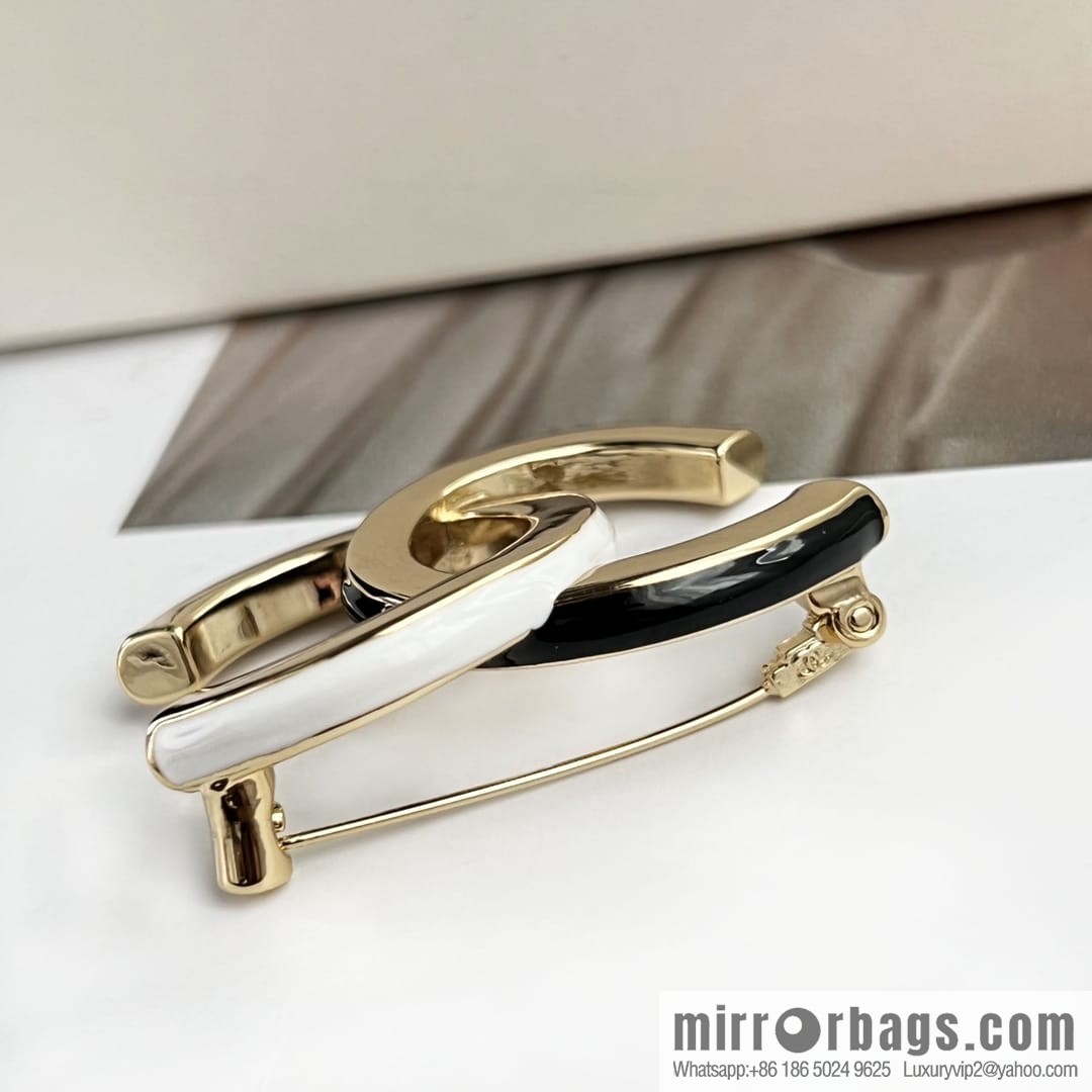 New ☑️ Chanel double c black and white smooth brooch