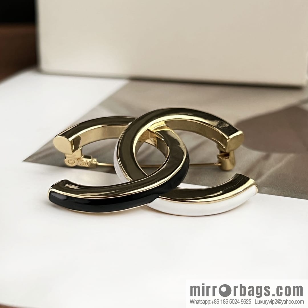 New ☑️ Chanel double c black and white smooth brooch