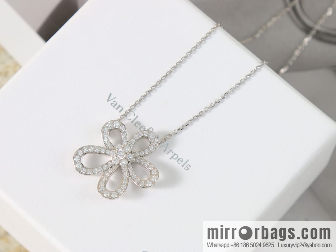 Van Cleef & Arpels Rose de Noel Diamond flower necklace earrings