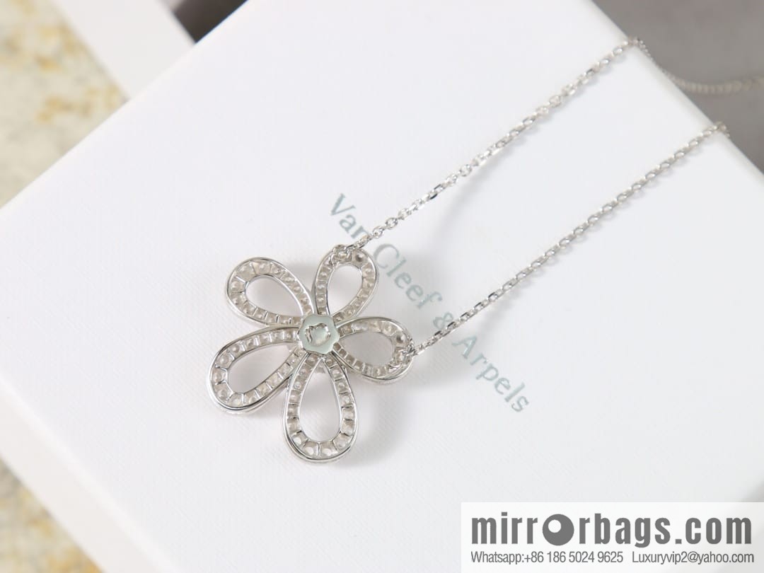 Van Cleef & Arpels Rose de Noel Diamond flower necklace earrings