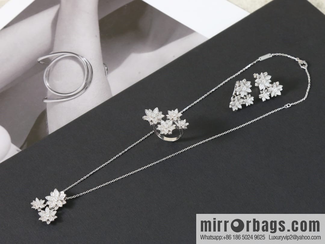 Van Cleef & Arpels Lotus Ear Pat Earrings