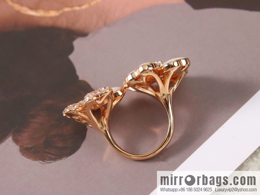 Van Cleef & Arpels cosmos four-leaf clover fritillary ring
