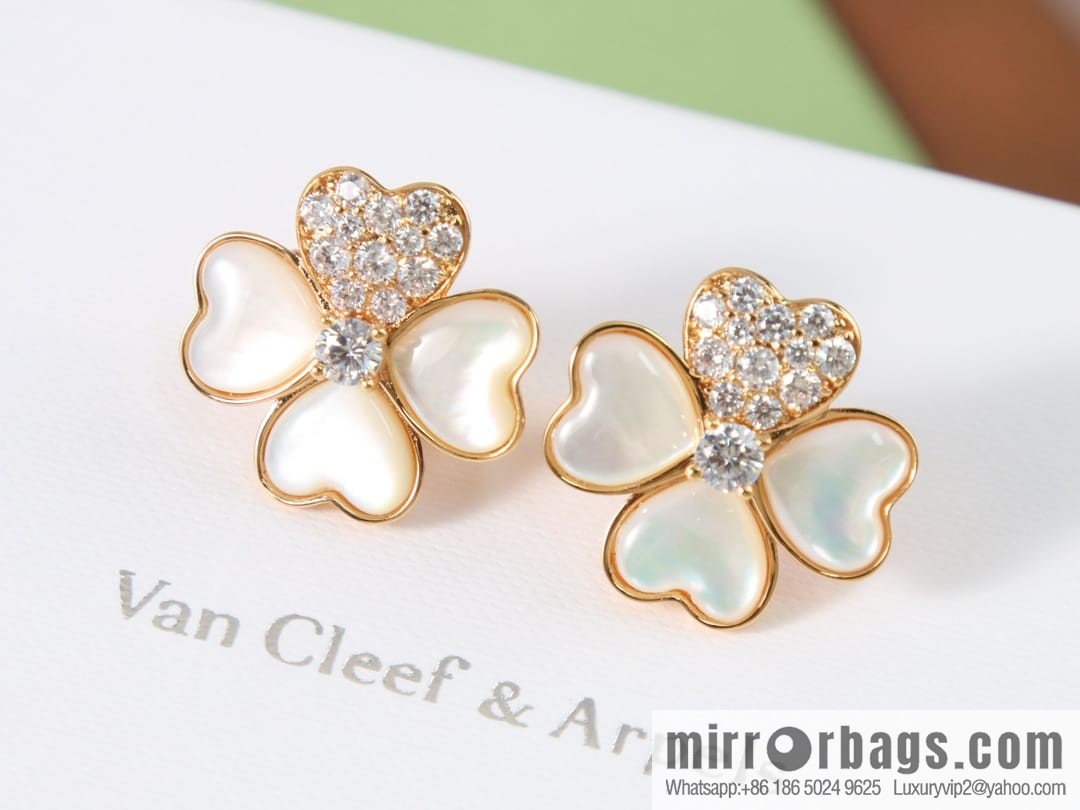 Van Cleef & Arpels cosmos four-leaf clover fritillary earshot