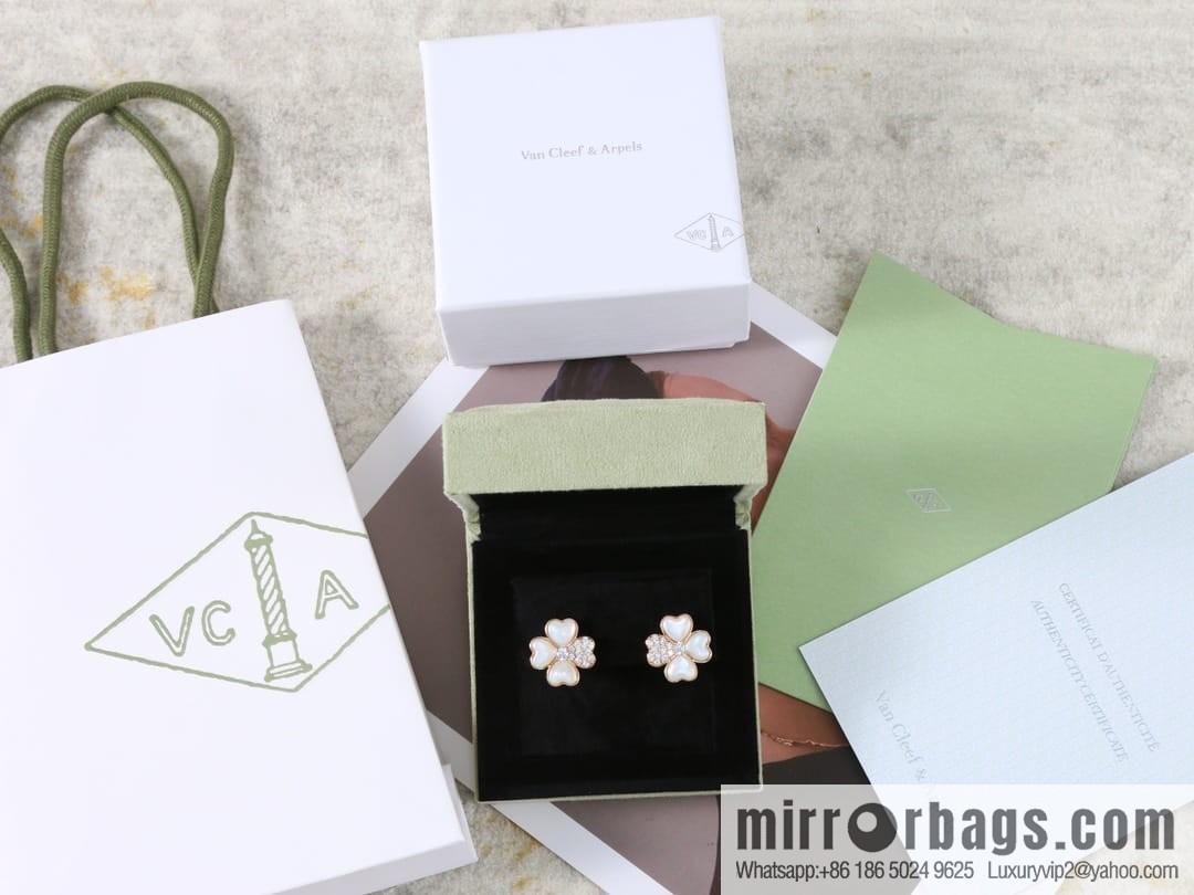 Van Cleef & Arpels cosmos four-leaf clover fritillary earshot