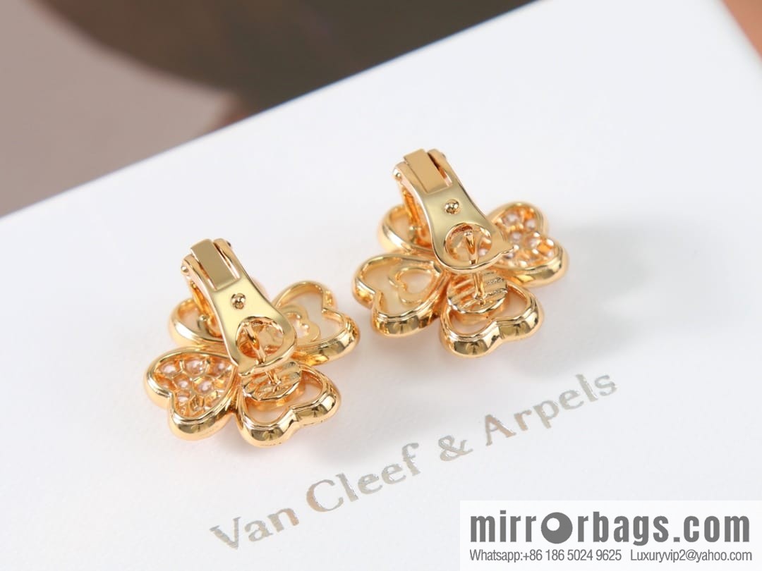 Van Cleef & Arpels cosmos four-leaf clover fritillary earshot