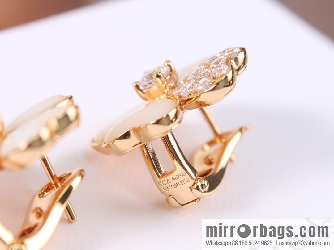 Van Cleef & Arpels cosmos four-leaf clover fritillary earshot