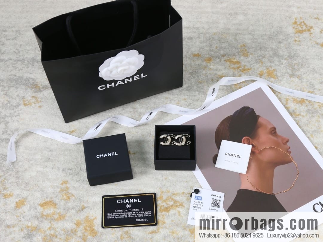 New ☑️ Chanel c1 double c black and white stud earrings