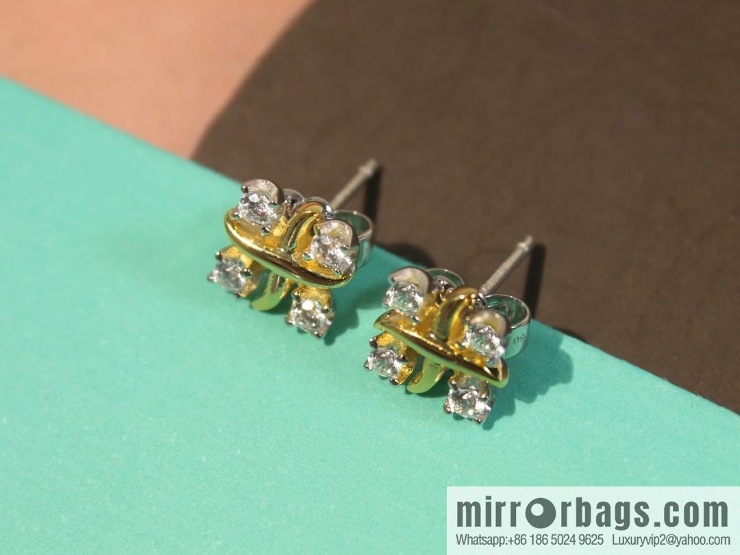 New ☑️ TIFFANY & Co. Tiffany & Co. Color separation cross stud earrings