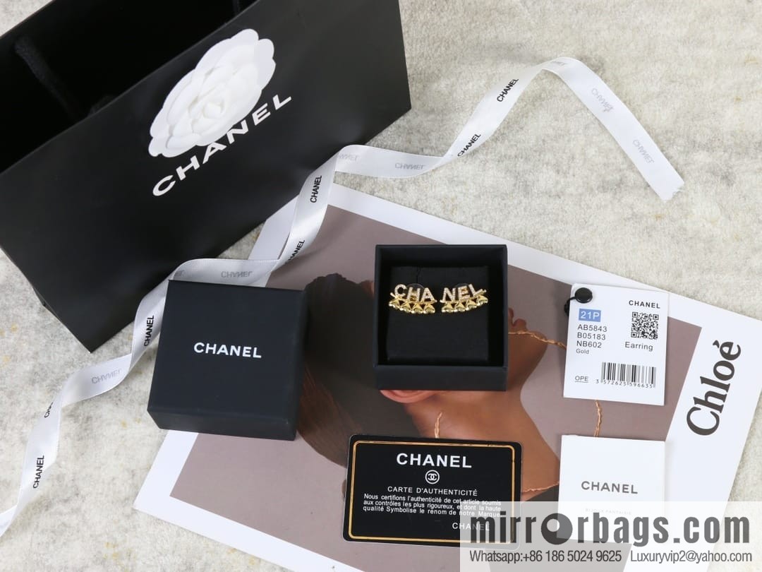 New ☑️ Chanel c1 letter asymmetric stud earrings