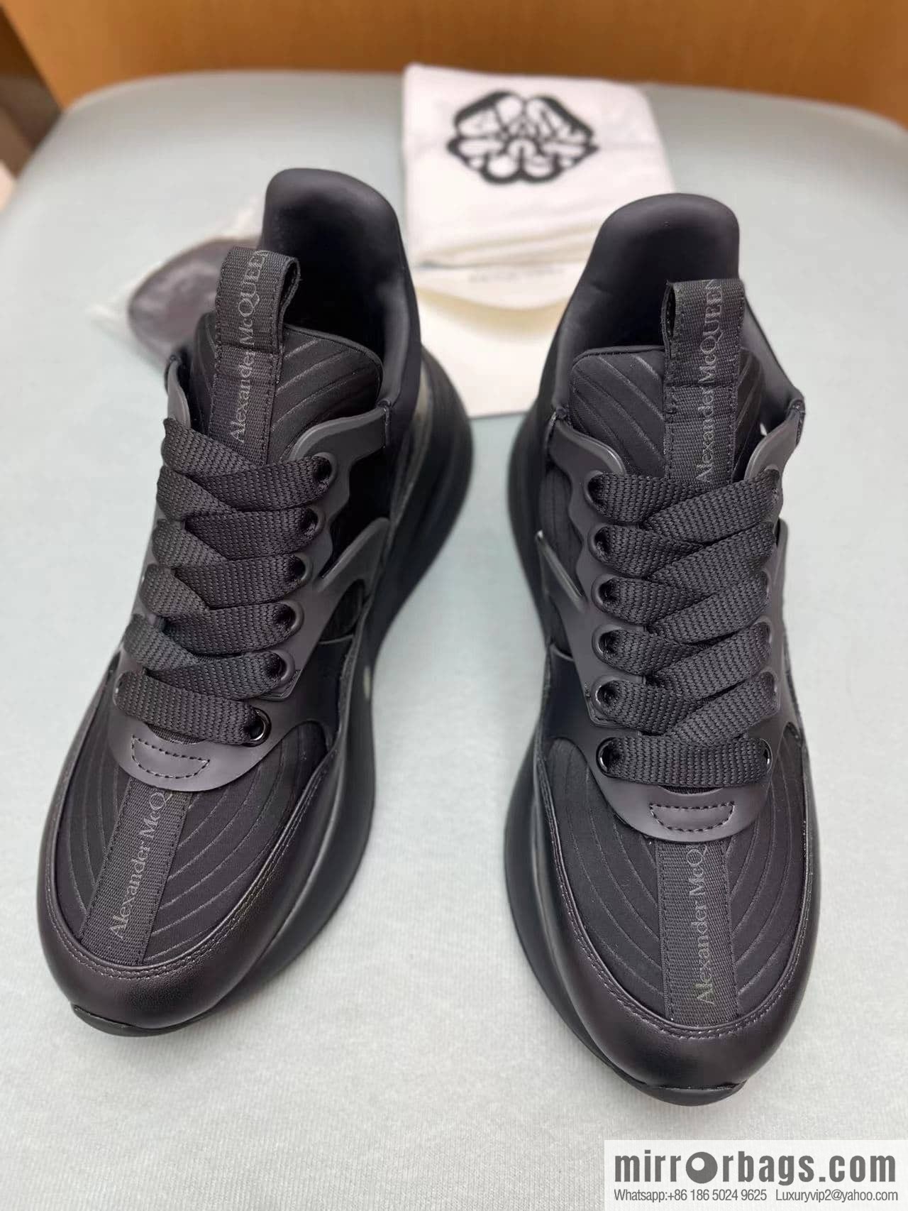 Alexander McQueen with neoprene, nappa leather (fabric) and rubber upholstery His & Hers sneakers