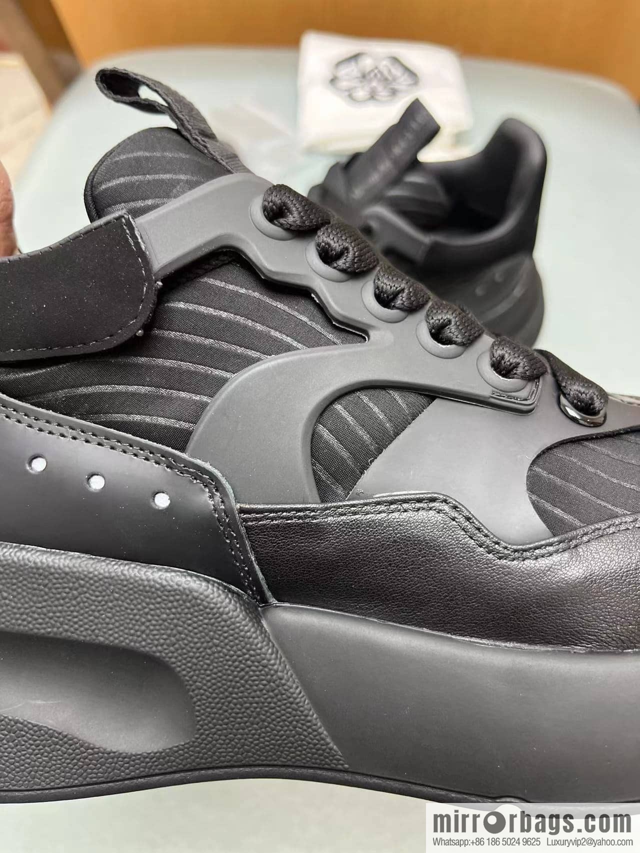Alexander McQueen with neoprene, nappa leather (fabric) and rubber upholstery His & Hers sneakers