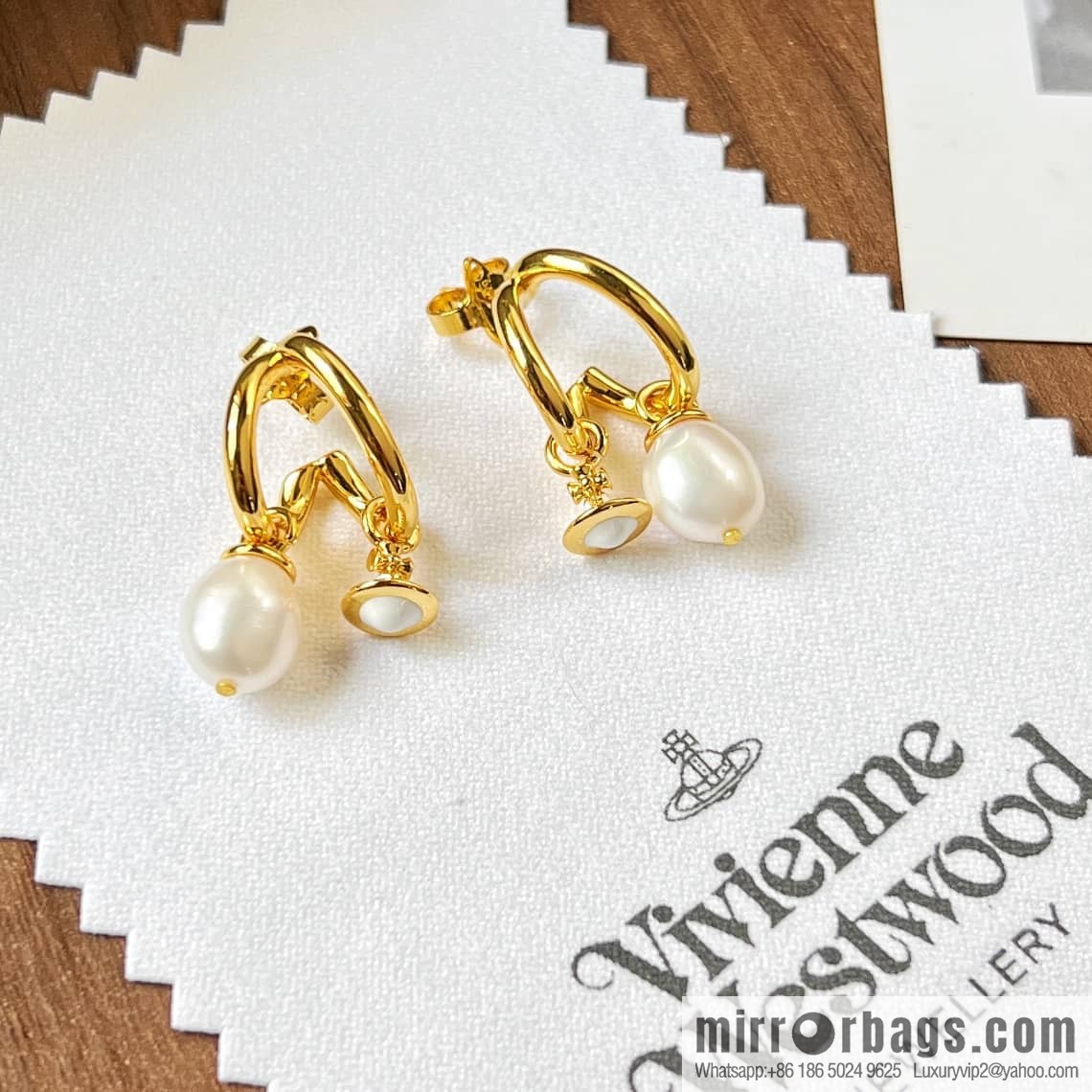New ☑️ Vivienne Westwood gold Saturn pearl stud earrings