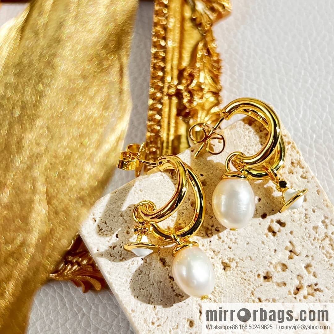 New ☑️ Vivienne Westwood gold Saturn pearl stud earrings