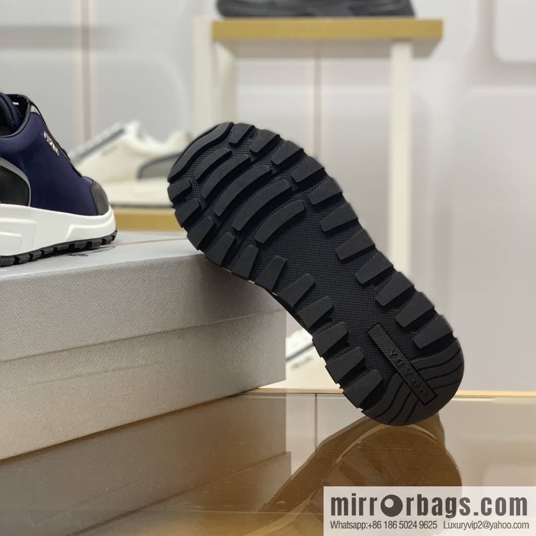 Prada is made of soft leather (fabric) and nylon patchwork men's sneakers