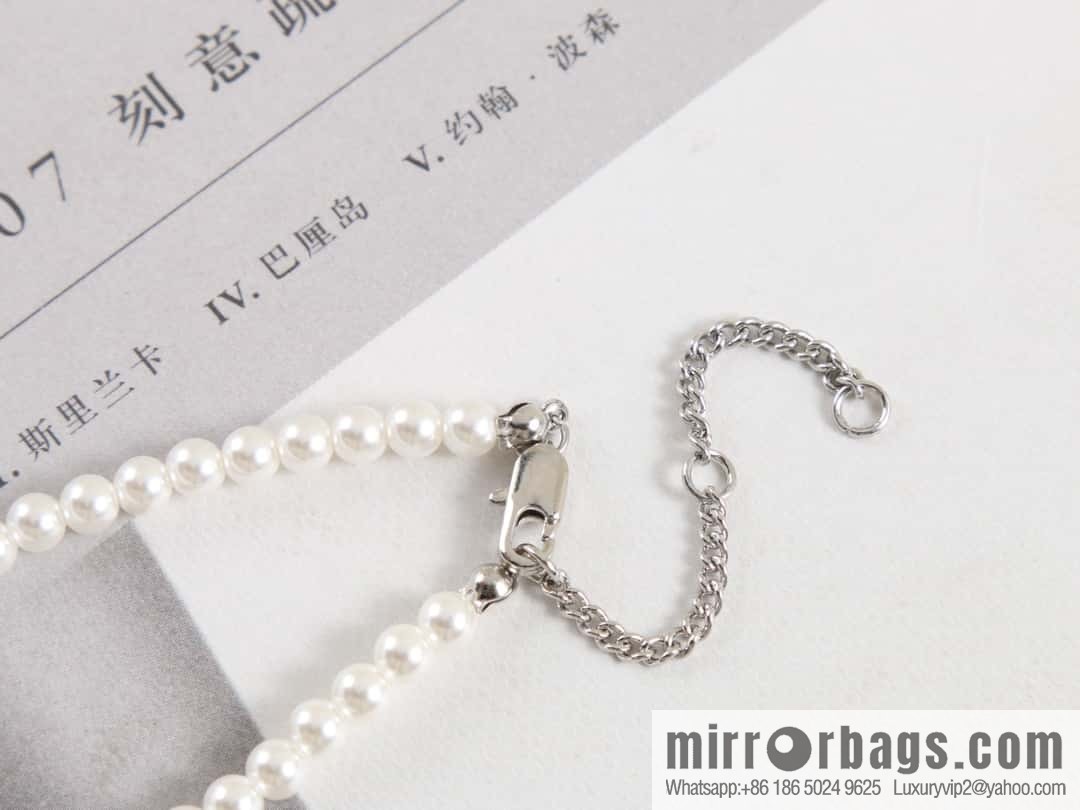 New ☑️ Celine tassel letter pearl necklace