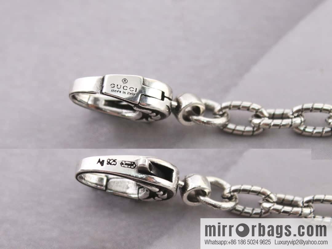 Gucci cross cut-out double G necklace