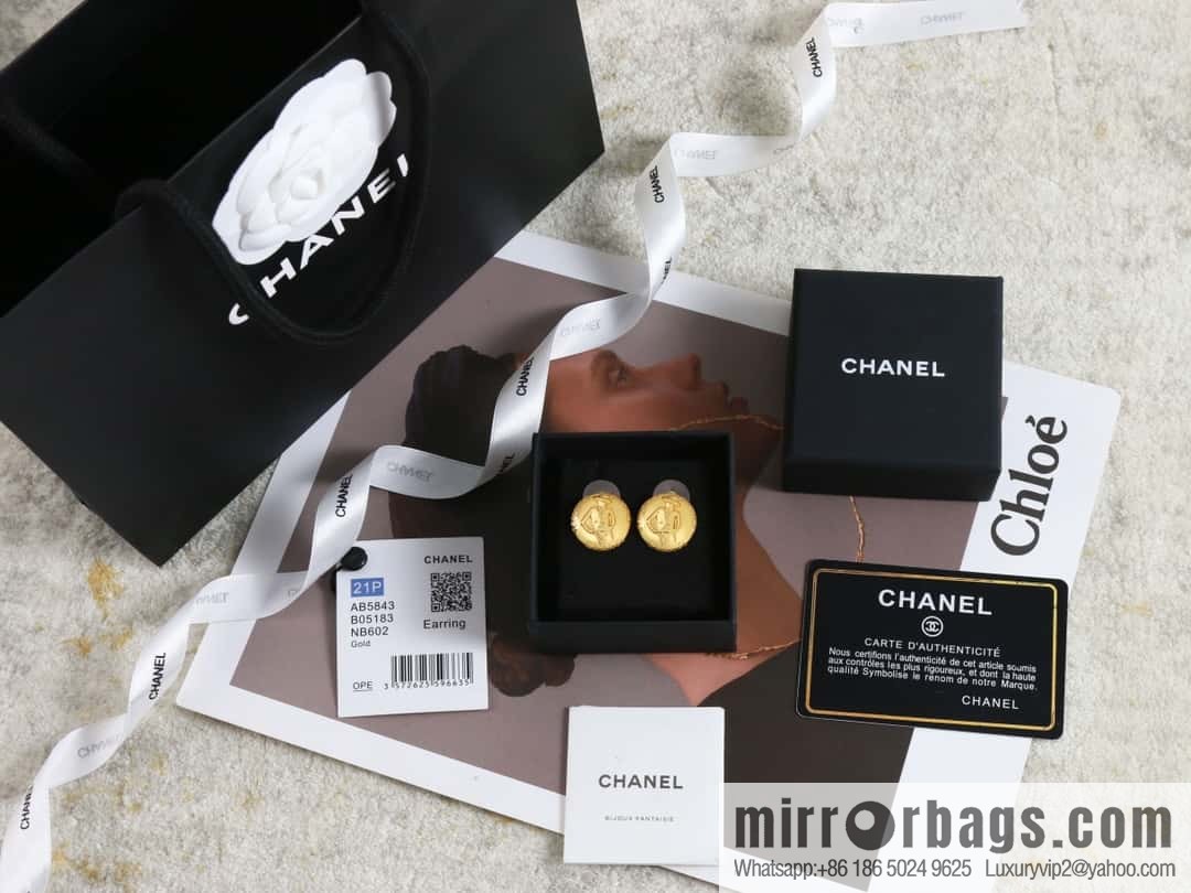 New ☑️ Chanel medieval series gold round earrings