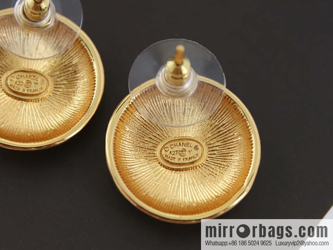 New ☑️ Chanel medieval series gold round earrings