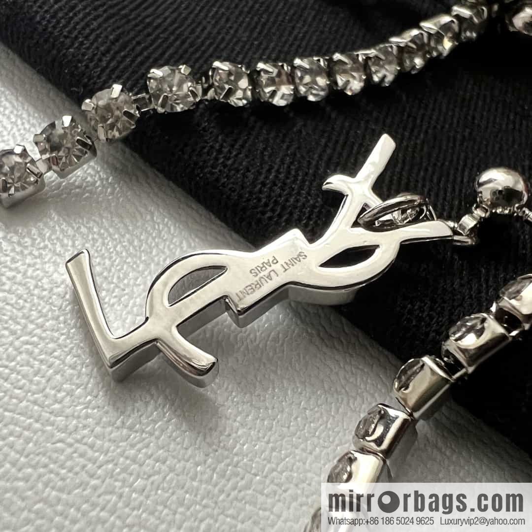Saint Laurent YSL fringed stud earrings